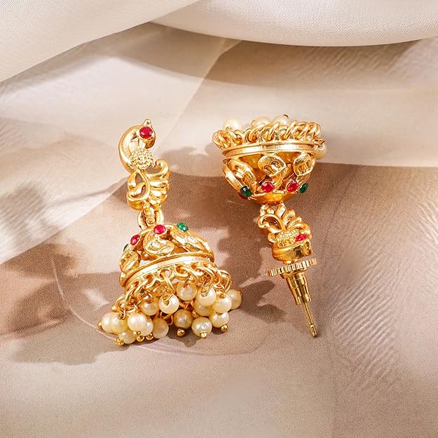 Gold temple jewellery set for marriage with traditional bridal design