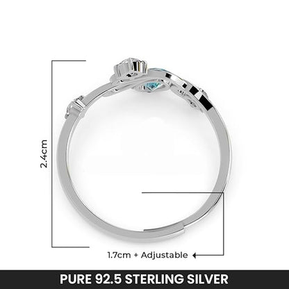 silver-ring-with-blue-gem