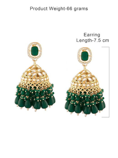 Green jhumka earrings with traditional Indian detailing
