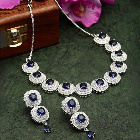 AD Set Jewellery in Rhodium Plated Silver Toned Triangular Shaped American Diamond Studded Jewellery Set