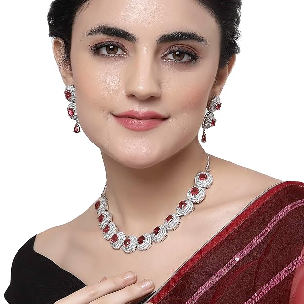 AD Set Jewellery in Rhodium Plated Silver Toned Triangular Shaped American Diamond Studded Jewellery Set